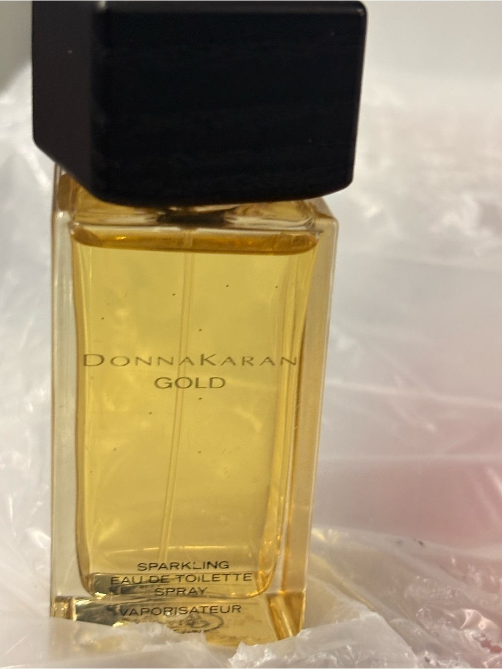 Donna Karan Gold Women's Eau de Toilette — Gold & Black Accents